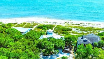 On the beach, sun loungers, beach towels