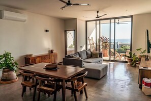 Deluxe Apartment, 2 Bedrooms, Kitchen, Ground Floor | Living area | Flat-screen TV