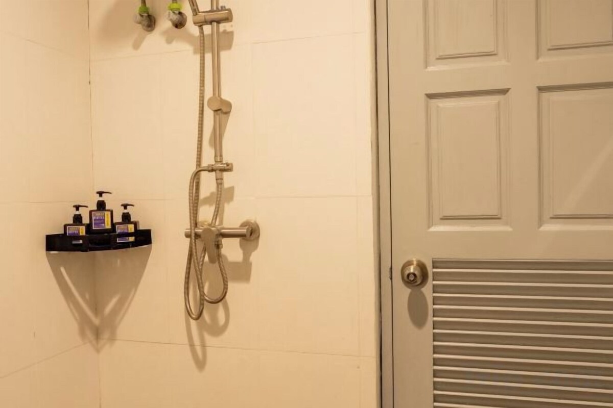 Bathroom | Shower, rainfall showerhead, hair dryer, bidet