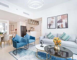 Elite Apartment | Living area | 65-inch LED TV with satellite channels - Vogue - Downtown Views- II (Dubai)