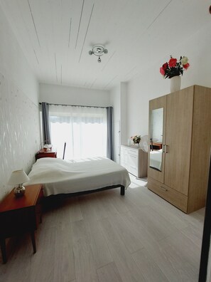 1 bedroom, desk, iron/ironing board, travel cot
