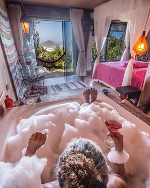 Romantic Suite, 1 Bedroom, Jetted Tub, Sea View | Minibar, in-room safe, individually furnished, blackout drapes