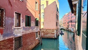 A narrow canal in a historic European town with buildings on either side. - San Marco Canal View (200m from St. Mark´s Square) (Venecia)