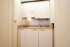 Fridge, microwave, coffee/tea maker, electric kettle