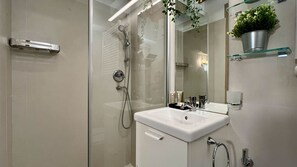 Regadera, secadora de cabello, bidet 