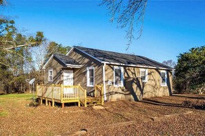 A single-story house with a front deck and a satellite dish. - Tiger's Refuge 2br/1ba home 10 min. from Clemson U (Central)