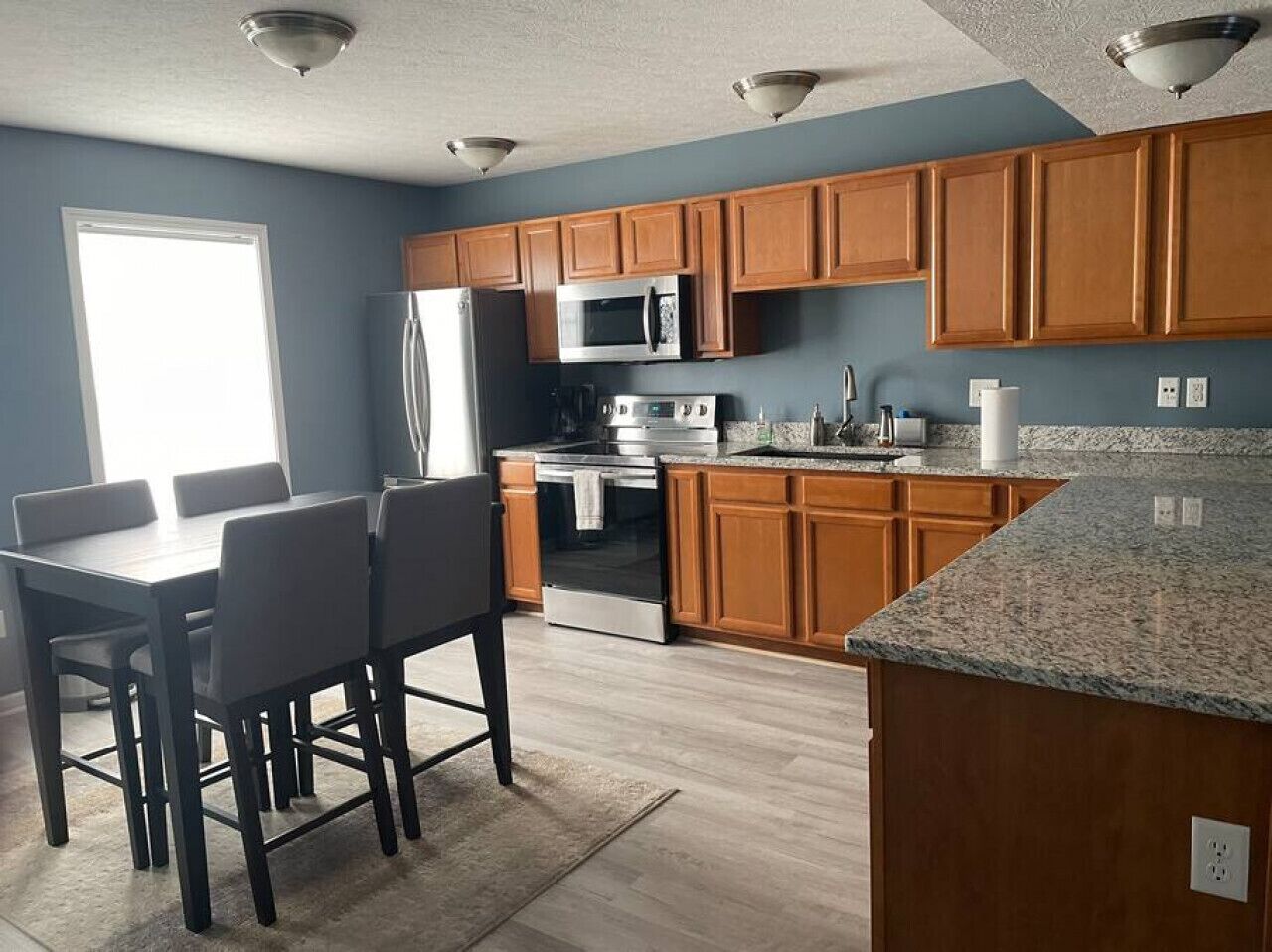 Fridge, coffee/tea maker, cookware/dishes/utensils