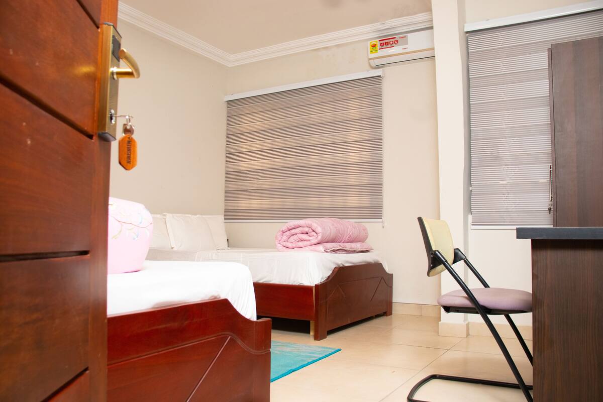 Executive Twin Room | Desk, blackout drapes, soundproofing, iron/ironing board (on request)