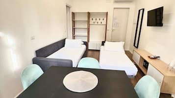 Family Suite | 1 bedroom, down comforters, in-room safe, blackout drapes