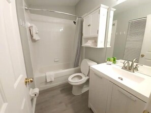 Hair dryer, towels, soap, toilet paper