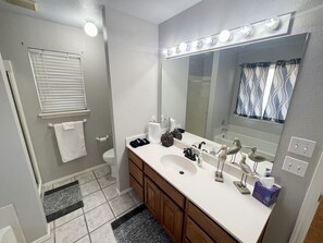 Hair dryer, towels, soap, shampoo