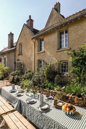 Outdoor dining - Domaine de la Chambaudière is a former monastery steeped in history, nestled in (Molineuf)