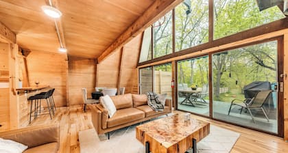 Rustic Riverside A-Frame Retreat: Secluded Charm.