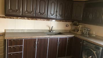 Fridge, microwave, oven, cookware/dishes/utensils