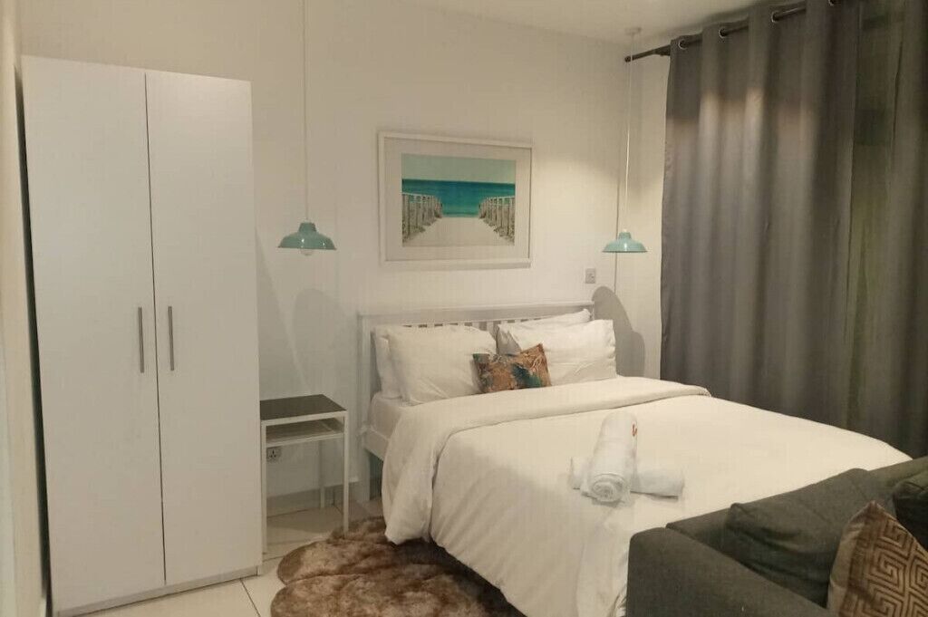 2 dormitorios, tabla de planchar con plancha, wifi gratis y ropa de cama