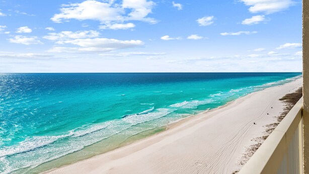A beach with clear turquoise waters and a sandy shore. - GULF FRONT BEDROOM @ CELADON BEACH RESORT ~FREE Beach Chair Service! (Panama City Beach)