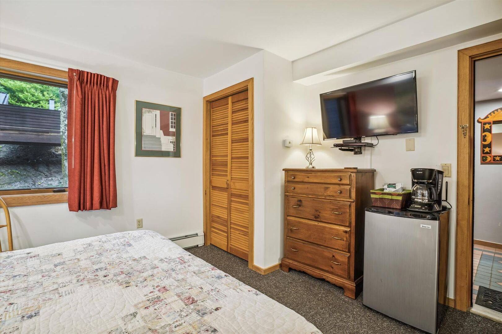 Settle In and Stay Comfortable - With thoughtful amenities and easy access to the adjoining bathroom, this bedroom is designed for a relaxing getaway.