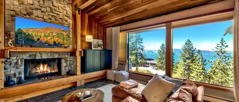 Una televisión, una chimenea, videojuegos, un reproductor de DVD