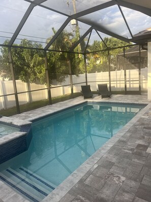 A heated pool - Brand new home & pool ready for enjoyment minutes from beach and best dining. (Naples)