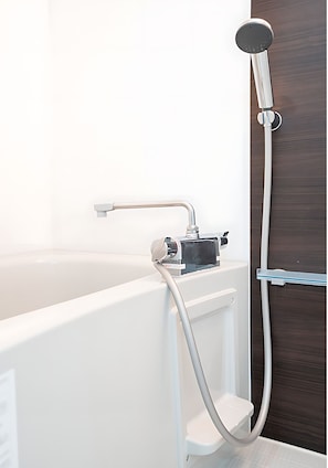 Hair dryer, bidet, towels, shampoo