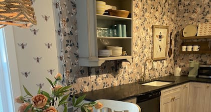 "BEE Home away from Home!"
A pioneer charmer, fully updated with buzzing decor.