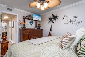 The master bedroom with a king size bed includes a wall-mounted TV wit cable. - Dock Views, Near Beach, Heated Pool, Private Beach (Sarasota)