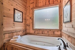 Bathtub, hair dryer, towels