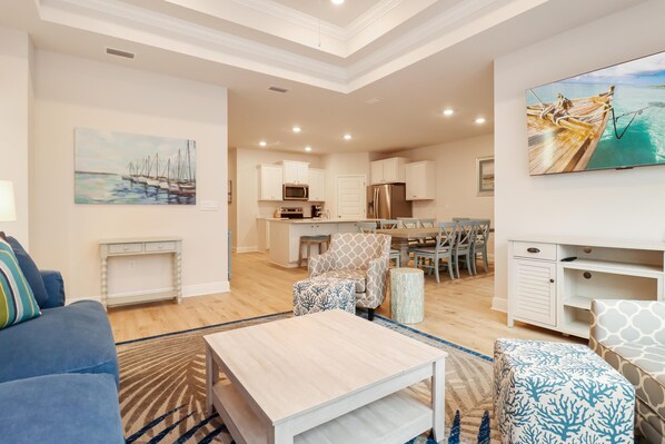 Casa, varias camas (WindMark Beach North) | Área de sala de estar