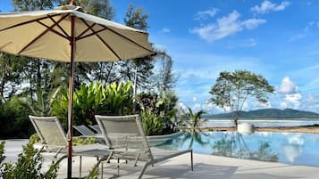 Outdoor pool, pool umbrellas, pool loungers