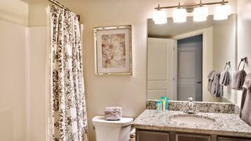 Bathtub, hair dryer, towels