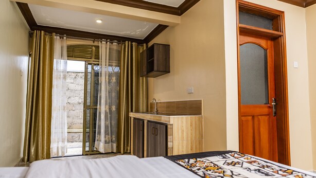 Garden View Deluxe Rooms(Five Units) | 1 bedroom, in-room safe, desk, laptop workspace - Triple Tee Gardens & Accomodation (Kampala)