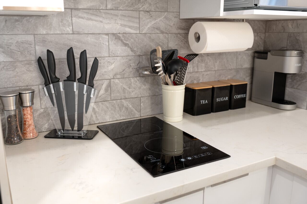 Fridge, microwave, stovetop, coffee/tea maker