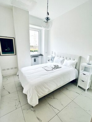 2 dormitorios, tabla de planchar con plancha, wifi gratis y ropa de cama