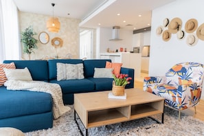 Exclusive Apartment | Living area | 55-inch Smart TV with cable channels
