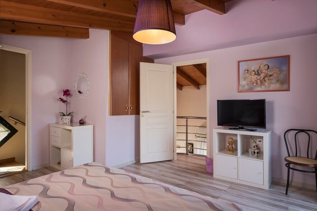 Comfortable, Spacious Room Featuring Entertainment Options