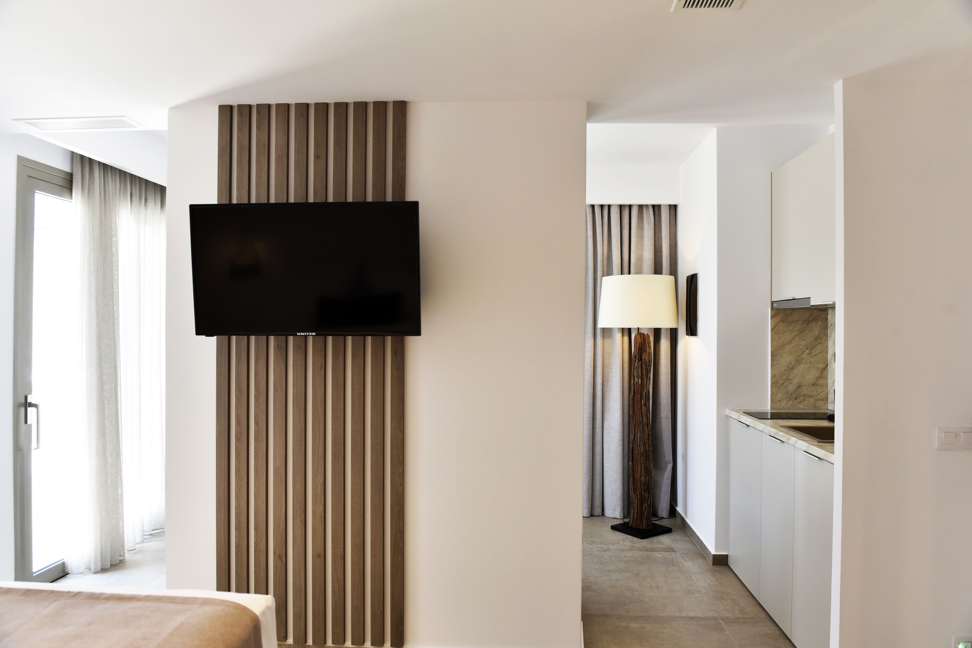 Deluxe Suite, Partial Sea View | 1 bedroom, Egyptian cotton sheets, premium bedding, in-room safe