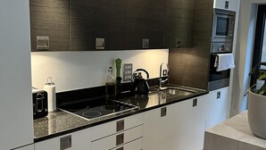 Apartment, 1 Queen-Bett | Eigene Küche | Kühlschrank, Mikrowelle, Ofen, Herdplatte
