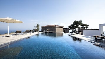 Outdoor pool, open 9:00 AM to 7:30 PM, free cabanas, pool umbrellas