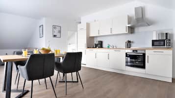 Family Apartment, 2 Bedrooms | Private kitchen | Fridge, microwave, oven, stovetop