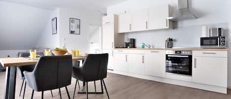 Family Apartment, 2 Bedrooms | Private kitchen | Fridge, microwave, oven, stovetop