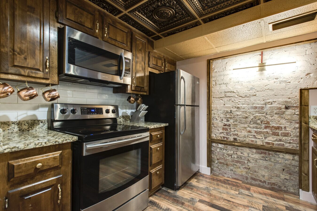 Refrigerador, microondas, horno y parrilla de estufa 