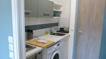 Fridge, microwave, oven, cookware/dishes/utensils