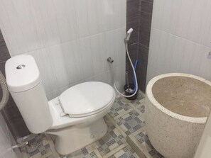Executive Triple Room | Bathroom | Shower, towels, soap, toilet paper