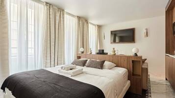 1 habitación, tabla de planchar con plancha, wifi gratis y ropa de cama