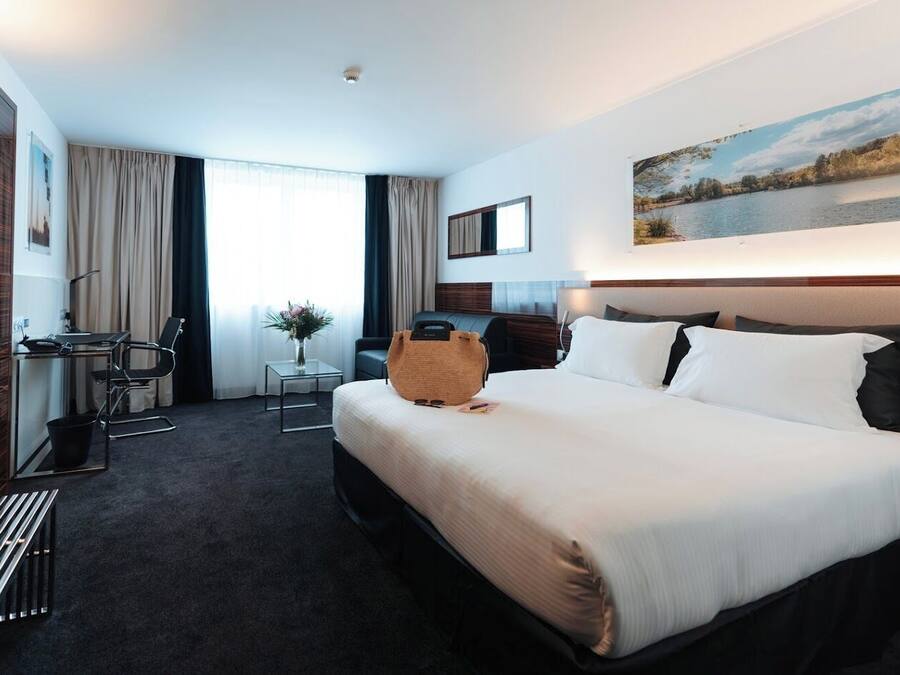 Ropa de cama de alta calidad y minibar