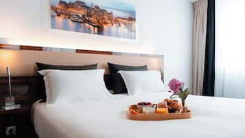 Ropa de cama de alta calidad y minibar