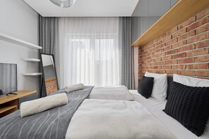 Apartamento, 1 habitación, balcón | 1 dormitorio y ropa de cama