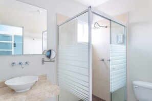 Shower, hair dryer, towels, soap