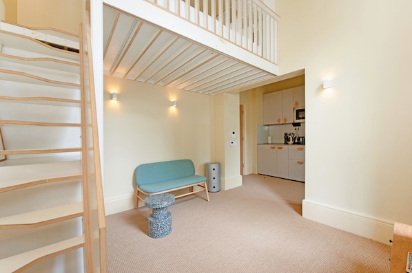 Apartment (0 Bedroom) | Living area | 32-inch TV with cable channels
