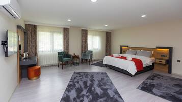 2 bedrooms, premium bedding, laptop workspace, blackout drapes